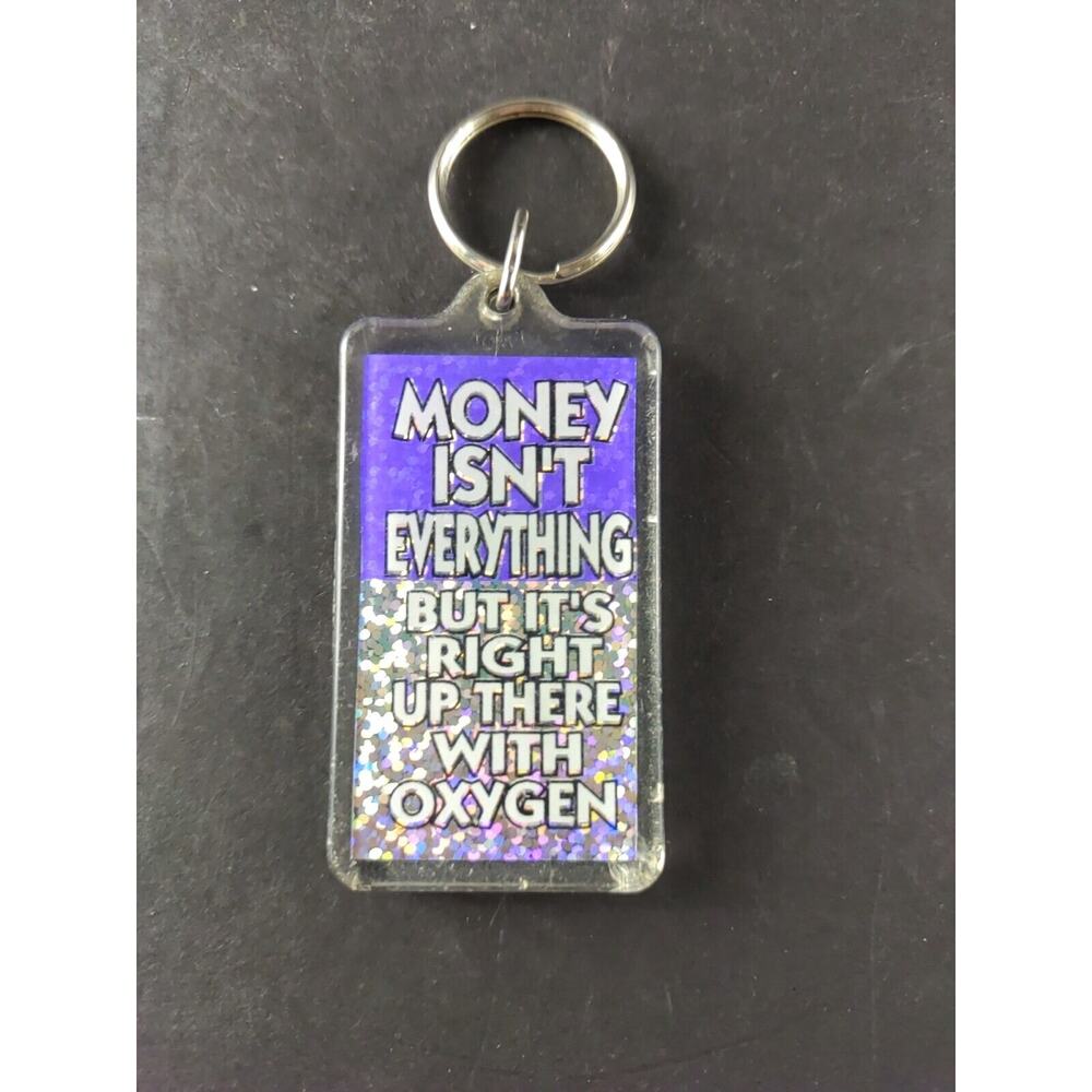 Money Isn't Everything Acrylic Keychain Purple Glitter